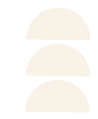 Here's an alt tag for the image: Three golden-brown taco shells stacked.